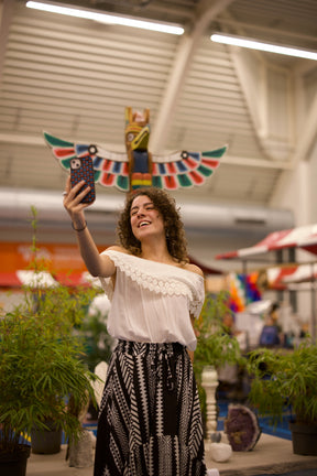 Spiritual Experience Event smile with phone 